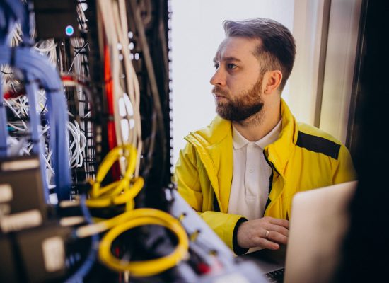 Young man engineer making program analyses